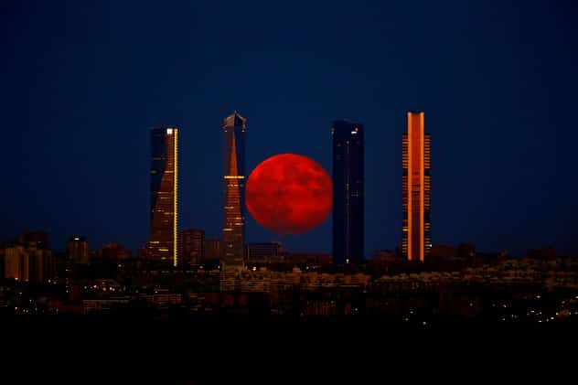 Moon rises over Four Towers in Spain, 2014 (AP)