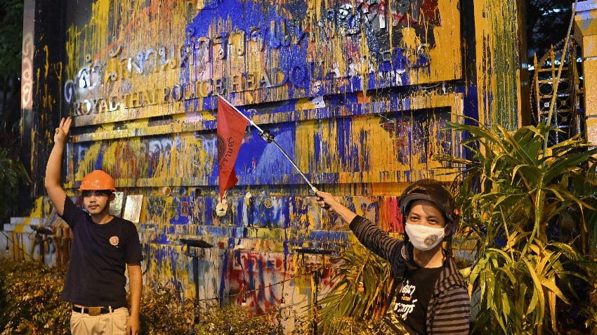 Paint drips off Thai police HQ walls, protests heat as country leader calls for crackdowns