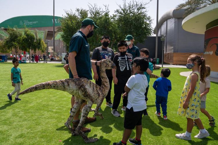 Young visitors come face to face with a menagerie of dinosaurs at Expo 2020 Dubai's Al Forsan Park