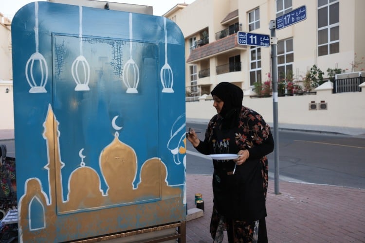 Artists beautify clothing donation boxes for Ramadan